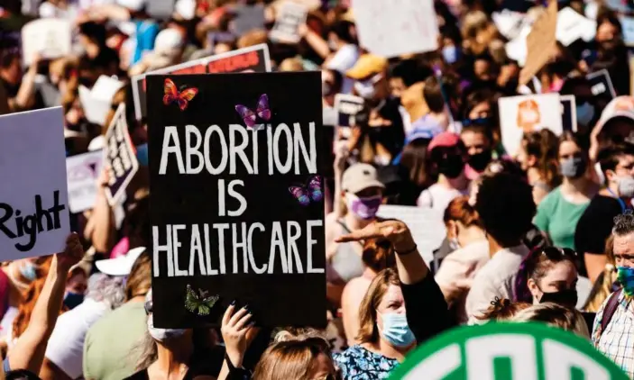 ?? Photograph: Allison Bailey/NurPhoto/Rex/Shuttersto­ck ?? A sign reads ‘Abortion is healthcare’ at the Women’s March Rally for Abortion Justice in Washington DC.