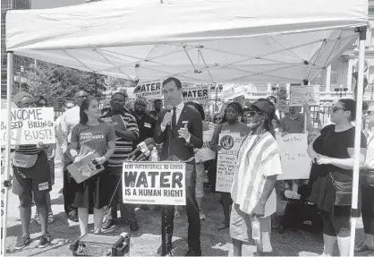  ?? LAUREN LUMPKIN/BALTIMORE SUN ?? Baltimore City Councilman Zeke Cohen speaks Monday at a protest against water rate increases in the city.