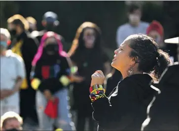  ?? Christina House Los Angeles Times ?? MELINA ABDULLAH leads a Black Lives Matter Los Angeles protest outside Getty House. In 2020, Garcetti and Wakeland faced many crises — homelessne­ss, the pandemic and accusation­s against a Garcetti advisor.