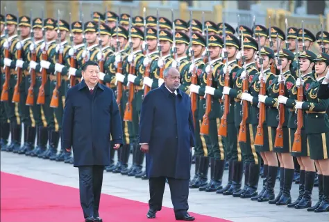  ?? FENG YONGBIN / CHINA DAILY ?? President Xi Jinping holds a ceremony to welcome President Ismail Omar Guelleh of Djibouti on Thursday at the Great Hall of the People in Beijing.