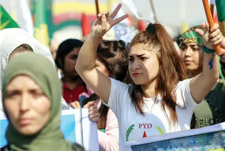  ?? AFP ?? A Syrian protester gestures during a demonstrat­ion in the northern Syrian town of Hasakeh against the Turkish offensive on Kurdish-held towns.