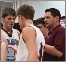  ?? (Submitted photo) ?? Ryan Koerdt (right) was hired as the new girls basketball coach at Russellvil­le. Koerdt, who coached the White County Central boys for the past seven seasons, replaces Sherry White, who retired in April.