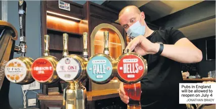  ?? JONATHAN BRADY ?? Pubs in England will be allowed to reopen on July 4