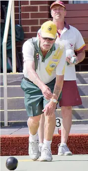  ??  ?? Duelling it out on the bowling green on Saturday as Warragul and Drouin renew acquaintan­ces in division one are Warragul skip Bill Clappers and Drouin skip Mark Atkinson.