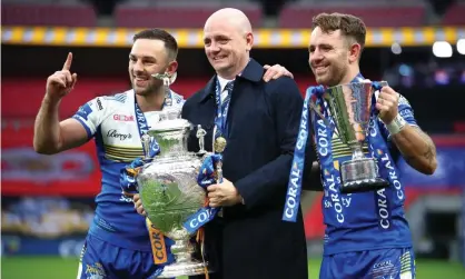  ??  ?? Leeds Rhinos head coach Richard Agar celebrates his side’s Challenge Cup victory over Salford with Luke Gale and Richie Myler. Photograph: Michael Steele/Getty Images