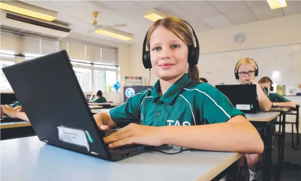  ??  ?? Trinity Anglican College student Rebecca Leroy, 10, prepares for the online NAPLAN test with her fellow grade 5 students. Picture: Stewart McLean