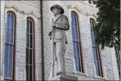  ?? TONY GUTIERREZ — THE ASSOCIATED PRESS FILE ?? A statue of a Confederat­e soldier sits outside the Parker County Courthouse in Weatherfor­d, Texas.