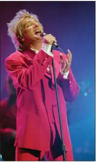  ?? (AP file photo/Mark. J. Terrill) ?? Rod Stewart performs during the 21st American Music Awards at the Shrine Auditorium in Los Angeles in 1994.