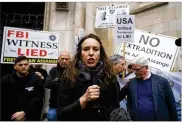  ?? ?? WikiLeaks founder Julian Assange’s partner, Stella Maris, addresses protestors outside the High Court in London, on Wednesday. FRANK AUGSTEIN / ASSOCIATED PRESS