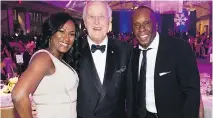  ??  ?? BIG SMILES ON THE BIG NIGHT: Bianelle Surin, former PM Brian Mulroney and Olympian Bruny Surin catch up at Windsor Station.