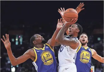  ?? ZHONG ZHI, GETTY IMAGES ?? Besides playing in China, Kevin Durant (35) and Stephen Curry (30) made sponsor appearance­s.