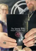  ?? Pictures: Esa Alexander ?? Adri Norton and Riaan Swiegelaar, co-founders of the South African Satanic Church, with some of the tools of their trade. They are opening a church branch at a hotel in Ballito.