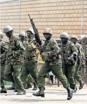  ?? /Reuters ?? Protest denied: Riot police are deployed to disperse a protest by supporters of Kenyan opposition leader Raila Odinga in Kisumu on Wednesday.