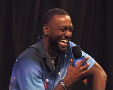  ?? Dustin Satloff / Getty Images ?? Kemba Walker laughs during his introducto­ry press conference with the Knicks on Tuesday in New York.