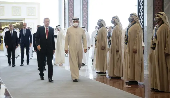  ?? Rashed Al Mansoori / Ministry of Presidenti­al Affairs ?? The President, Sheikh Mohamed, receives Turkish President Recep Tayyip Erdogan in Abu Dhabi yesterday. Mr Erdogan is one of many world leaders to travel to the capital to pay respects following the death of Sheikh Khalifa