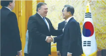  ?? POOL / REUTERS ?? United States Secretary of State Mike Pompeo (left) attends a bilateral meeting with South Korean President Moon Jae-in at the presidenti­al Blue House in Seoul, South Korea on Thursday, June 14.