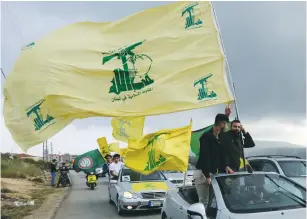  ?? (Aziz Taher/Reuters) ?? ISRAEL SOMETIMES contends with direct state-based threats, but often deals with Shi’ite militias sponsored by Iran including Hezbollah, pictured here, who can operate as both a military and terror group.