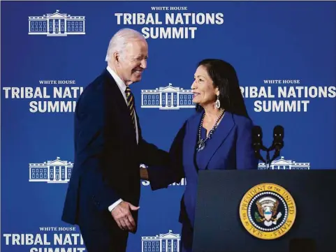  ?? Pete Marovich / Getty Images ?? President Joe Biden greets Department of the Interior Secretary Deb Haaland during the 2022 White House Tribal Nations Summit at the Department of the Interior on Wednesday in Washington, D.C. The Summit will feature new Administra­tion announceme­nts and efforts to implement key policy initiative­s supporting Tribal communitie­s.