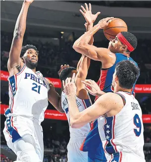  ?? JESSE D. GARRABRANT NBAE/GETTY IMAGES ?? Philadelph­ia paid a steep price for pending free agent Tobias Harris, with ball, sending sensationa­l rookie guard Landry Shamet and four draft picks to the Clippers, along with two other players.