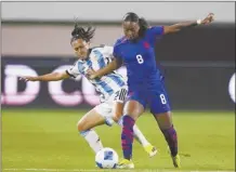  ?? AP photo ?? United States forward Jaedyn Shaw (right) and Argentina defender Eliana Stábile vie for the ball during the first half of a CONCACAF Gold Cup match Friday.