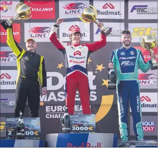  ?? Content Pool/Sebastian Marko) (Pic: ©INPHO/Red Bull ?? JAMES ON THE PODIUM – Pictured is Oliver Randalu of Estonia, Piotr Wiecek of Poland and James Deane of Castletown­roche and Ireland celebratin­g on the podium at the 2022 Drift Masters European Championsh­ip season opener at Mondello Park on Sunday, 8th of May. Watch the full DMEC including first stop highlights on Red Bull TV.