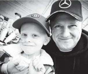  ??  ?? ●●Cancer patient Richie Walsh with dad Carl.