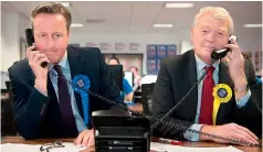  ??  ?? David Cameron and former Liberal Democrat leader Lord Paddy Ashdown do some phone canvassing at the Stronger In heaquarter­s (AFP)