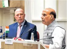  ??  ?? Defence Minister Rajnath Singh with Australian counterpar­t Peter Dutton during a joint press conference in New Delhi, on Friday