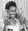  ?? THE ASSOCIATED PRESS ?? Tyson poses with her Emmy statuettes Tyson won for her role in "The Autobiogra­phy of Miss Jane Pittman" for actress of the year, special, and best lead actress in a television drama for a special program.