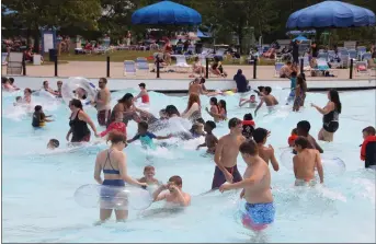  ?? MEDIANEWS GROUP FILE PHOTO ?? Swimmers staying cool at the Red Oaks Water Park in Madison Heights.