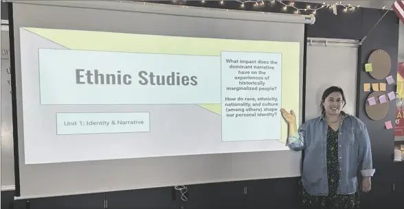  ?? BENJAMIN GONZALEZ PHOTO ?? Ethnic Studies teacher Blayke Barker presents master and counter-narratives at Southwest
High School on Oct. 27, 2023. Master and counter-narratives are ways in which people in the field of ethnic studies re-evaluate and correct certain assertions or falsities made by prominent narratives of historical figures, events, or trends.