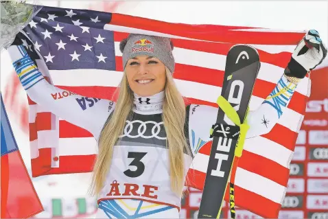  ?? SHINICHIRO TANAKA/ASSOCIATED PRESS ?? The United States’ Lindsey Vonn celebrates Sunday after winning bronze in the women’s downhill race at the alpine ski World Championsh­ips in Are, Sweden.