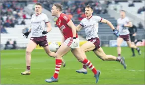  ?? (Pic: George Hatchell) ?? Cork’s Stephen Sherlock scoring a point as Galway’s Liam Silke and John Daly close in during the Allianz Football League Div. 2 Round 4 tie at Pairc Ui Chaoimh.