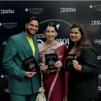  ?? ?? T+L Tastemaker­s Shivesh Bhatia, Anahita Dhondy and Pooja Dhingra strike a pose with their trophies.