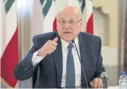  ?? REUTERS ?? Lebanese Prime Minister Najib Mikati gestures during a news conference on the latest developmen­ts in the country in Beirut.