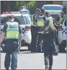  ??  ?? RAID: Police target suspects in the operation in Melbourne.