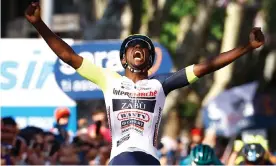  ?? ?? Biniam Girmay celebrates as he crosses the line. Photograph: Luca Bettini/AFP/Getty