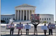  ?? ?? Demonstrat­ors rally outside the U.S. Supreme Court Wednesday in Washington. (AP/Jose Luis Magana)