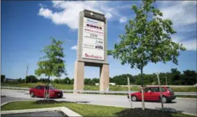  ?? SEAN SIMMERS/THE PATRIOT-NEWS-PENNLIVE.COM VIA AP ?? This June 19 photo shows West Manchester Town Center, a formerly dying mall that was “de-malled” and revitalize­d, in York, Pa. A developer removed the atrium and added a variety of shops and outlying restaurant­s.