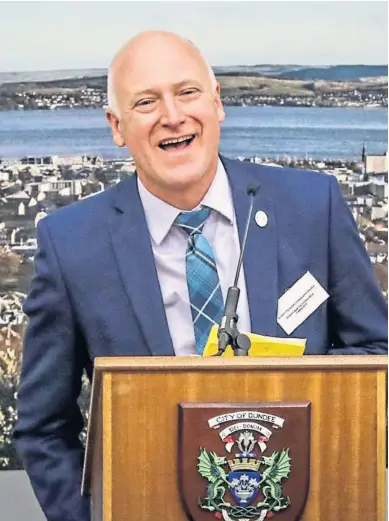  ??  ?? THRILLED: Joe Fitzpatric­k, above, is delighted as he holds on to his Dundee City West seat for the SNP last night. John Swinney, below, gives a speech after bolstering his majority in Perthshire North. Pictures by Mhairi Edwards and Steve Macdougall.