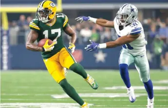  ?? | TONY GUTIERREZ/ AP ?? Davante Adams, who had 12 touchdown catches during the season, is nursing an ankle injury.