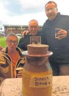  ??  ?? Dave’s friends scattering his ashes at Dens Park and, right, raising a toast to him at the ground.