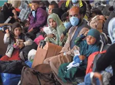  ?? OLIVIER DOULIERY/AP ?? Afghan refugees are processed at Ramstein U.S. Air Base in Germany on Wednesday. Welcome.US aims to bring groups together to boost resettleme­nt efforts.