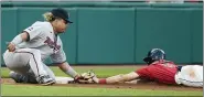  ?? TONY DEJAK — THE ASSOCIATED PRESS ?? The Twins’ Willians Astudillo tags out the Indians’ Owen Miller at third base in the fourth inning.