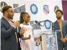  ?? BALTIMORE SUN LLOYD FOX/ ?? Nicole Dia, 18, a track athlete who is graduating from Poly, talks about the excitement of having the AAU Junior Olympics coming to Baltimore in 2028 and 2032 during a news conference at Morgan State University on Friday. Sign language interprete­r Billy Sanders, left, and Baltimore Mayor Brandon Scott look on.