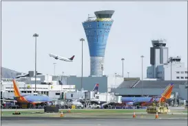  ?? JOHN GREEN/STAFFARCHI­VES ?? Planes take off at San Francisco Internatio­nal Airport. The Justice Department is looking into potential “unlawful coordinati­on” among some major airlines.