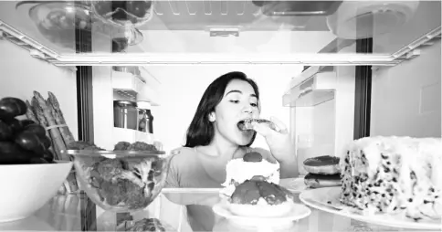  ??  ?? As the study highlights, our bodies metabolise foods differentl­y at different times of the day. Eating more calories at night, as opposed to earlier in the day, is linked to obesity, increased inflammati­on, and greater risk of heart disease and diabetes.