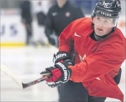  ?? RYAN REMIORZ - THE ASSOCIATED PRESS ?? FILE - In this Jan. 1, 2020, file photo, Canada’s Alexis Lafreniere shoots during the team’s practice at the World Junior Hockey Championsh­ips in Ostrava, Czech Republic.