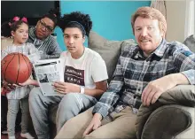  ?? RICHARD HUTTON METROLAND ?? Andrew Cole, second from right, sits with sister Natalia, mother Lorena Molina and Greg Miller, a coach at Sir Winston Churchill Secondary.