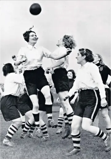  ??  ?? Heading for equality: Dick, Kerr Ladies’ Lily Parr (left) and training with Preston Ladies for a tour of Scotland